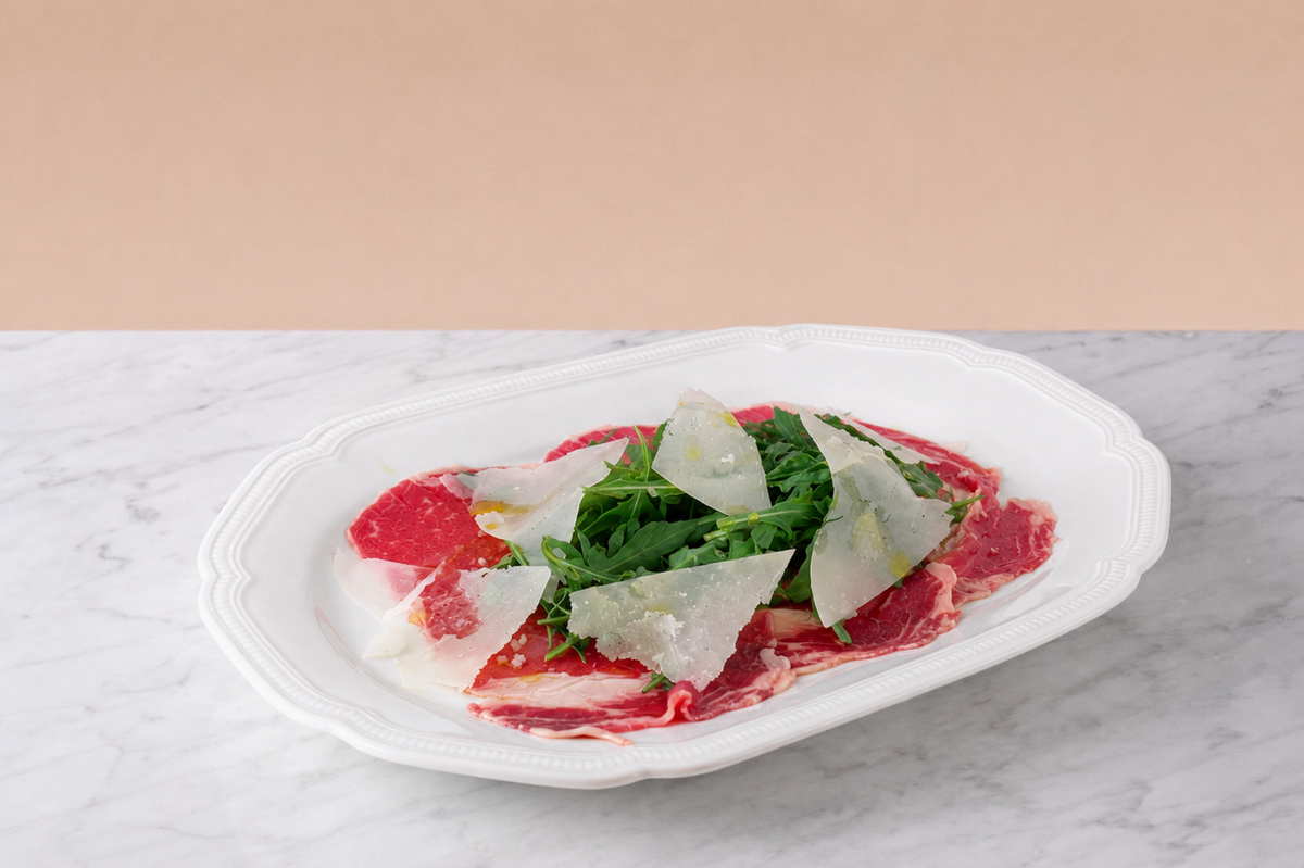 Ribeye carpaccio with smoked olives