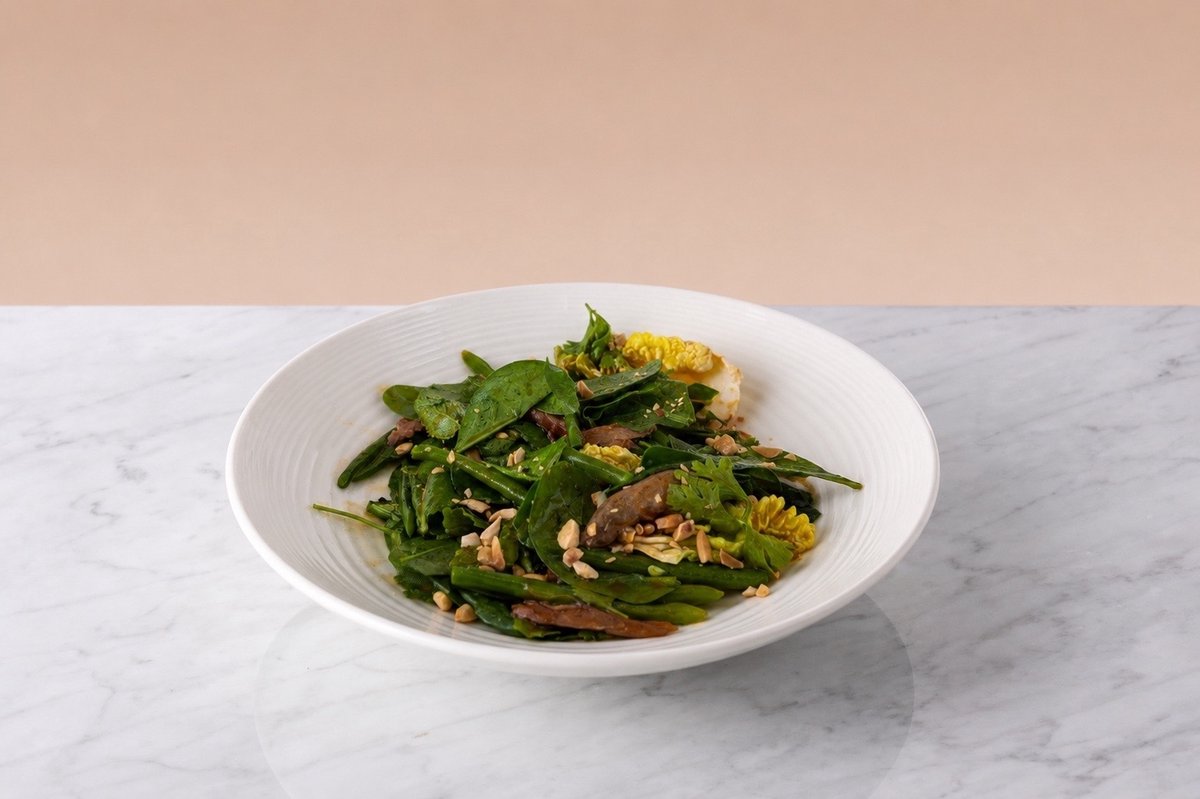 Salad with duck leg confit and sweet chili