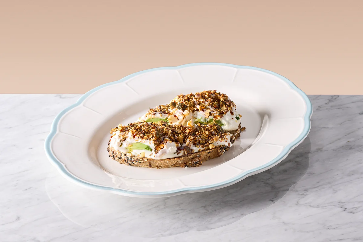 Avocado bruschetta with smoked burrata.