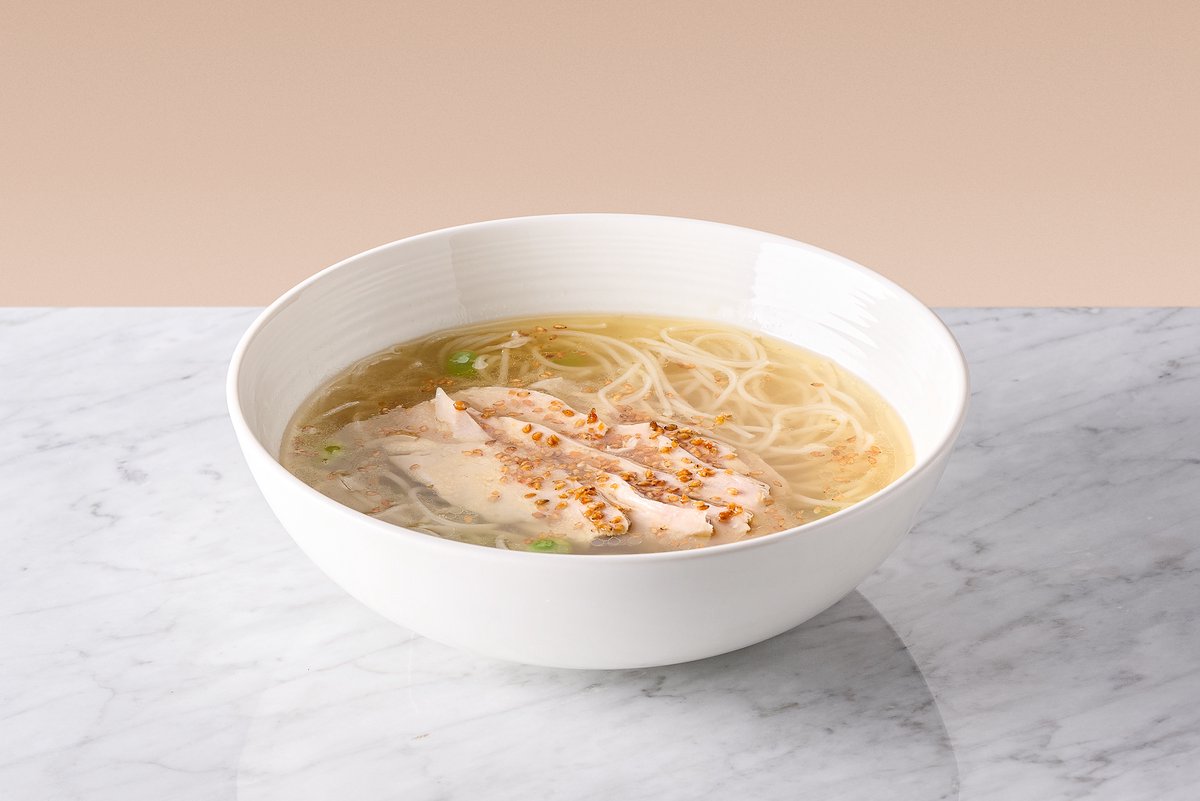 Chicken broth with noodles and sesame